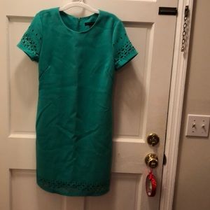 Sheath dress with cutouts